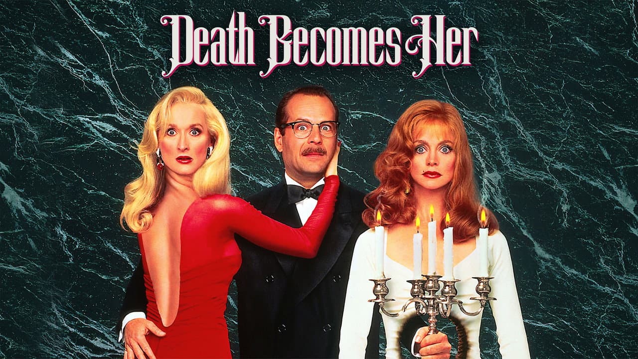Death Becomes Her — backdrops with title 1