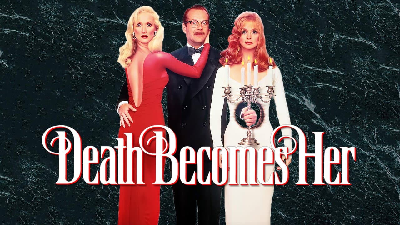 Death Becomes Her — backdrops with title 6